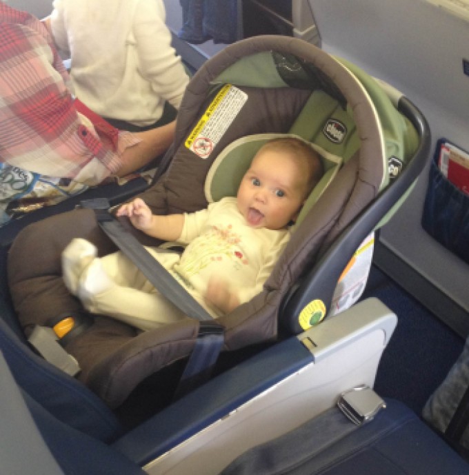 car seat and stroller on airplane